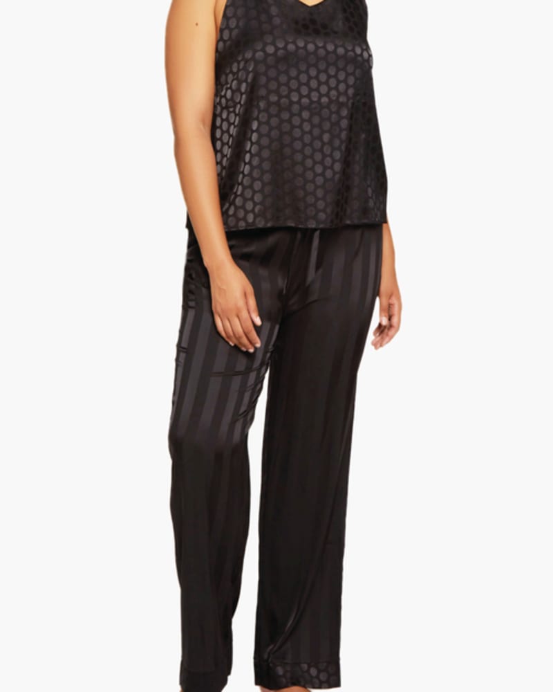 Front of a model wearing a size 1X Delphine Satin Cami & Pants Set in Black by iCollection. | dia_product_style_image_id:253832